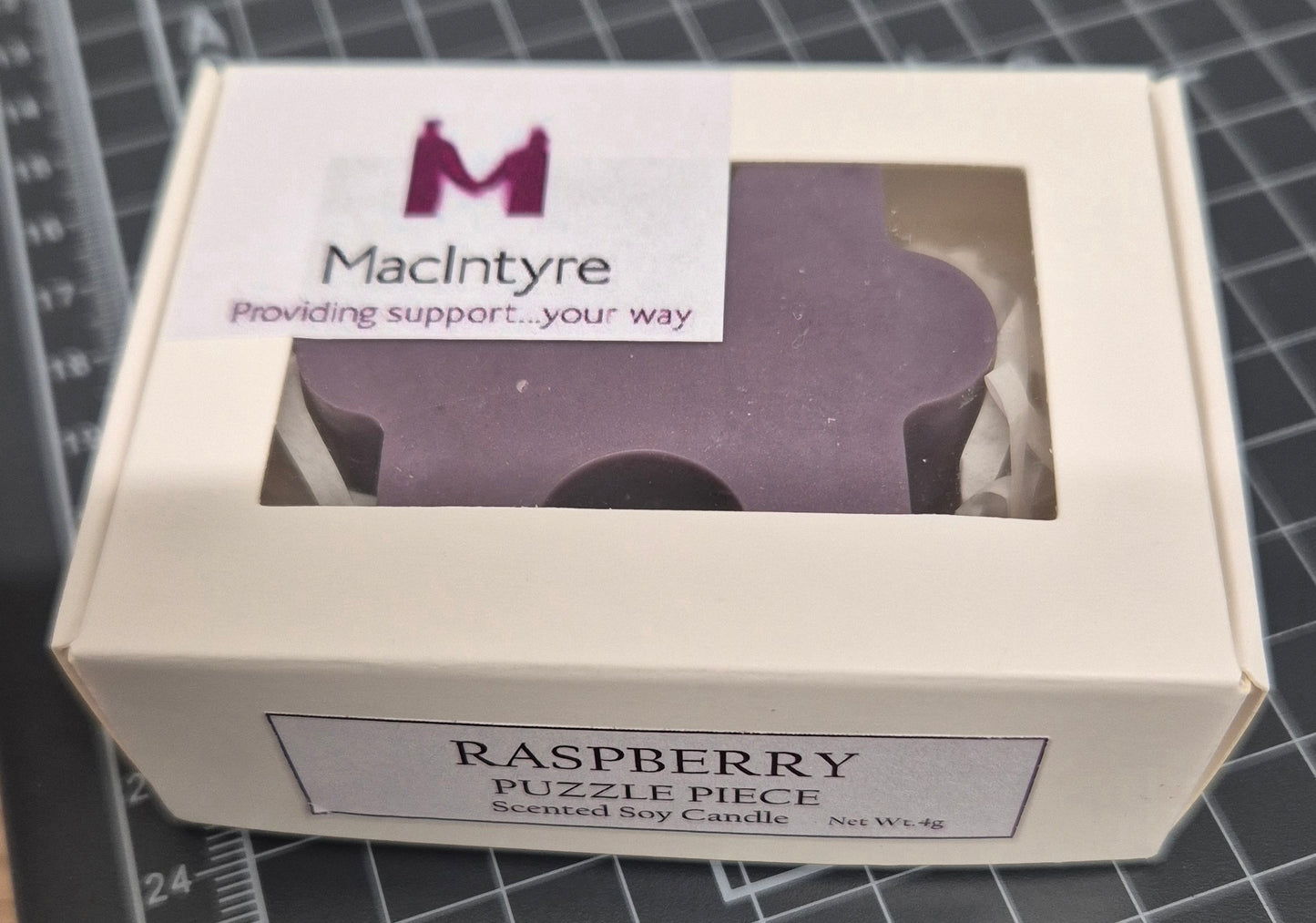 Macintyre Raspberry Puzzle Piece Candle